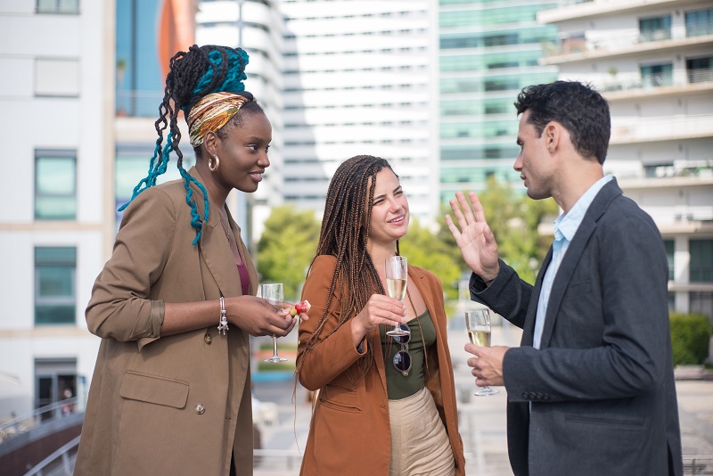 pleased-people-at-business-party-on-terrace-roof-man-and-women-in-formal-clothes-drinking-champagne-talking-eating-appetizers-teambuilding-party-concept.jpeg